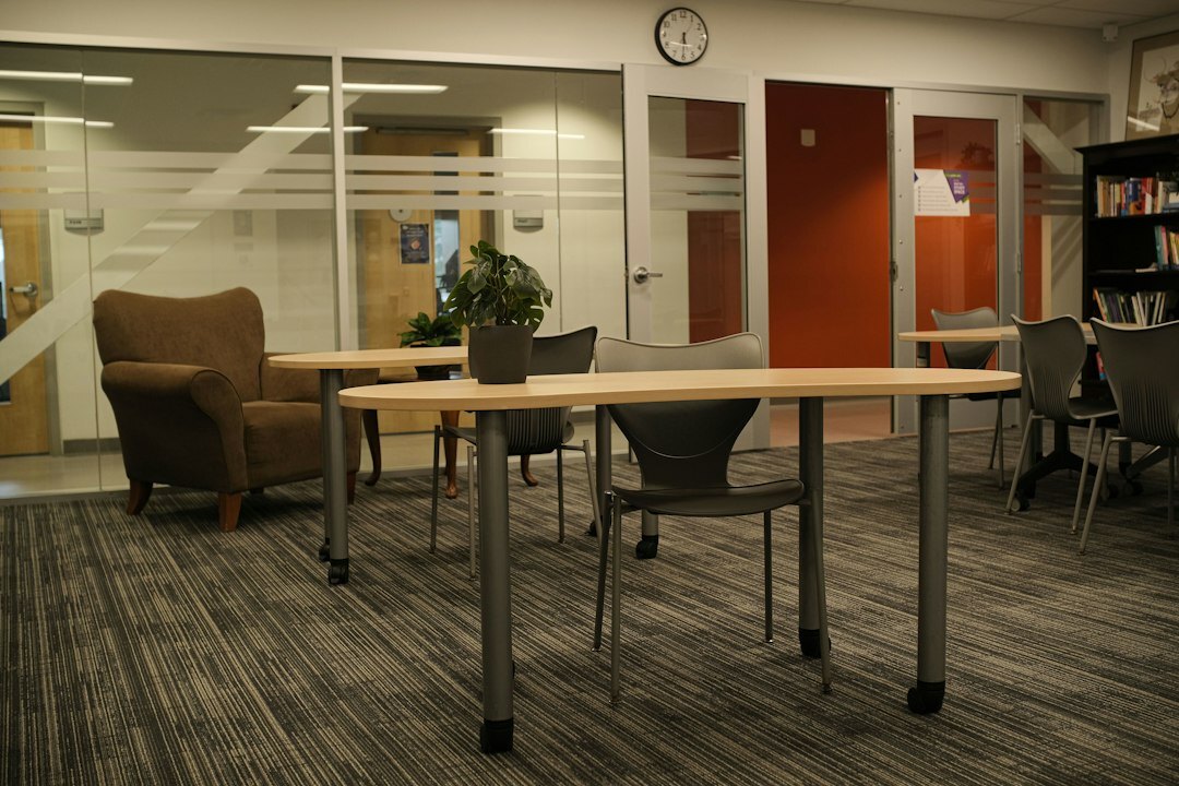Bright open study room with tables and chairs for group learning