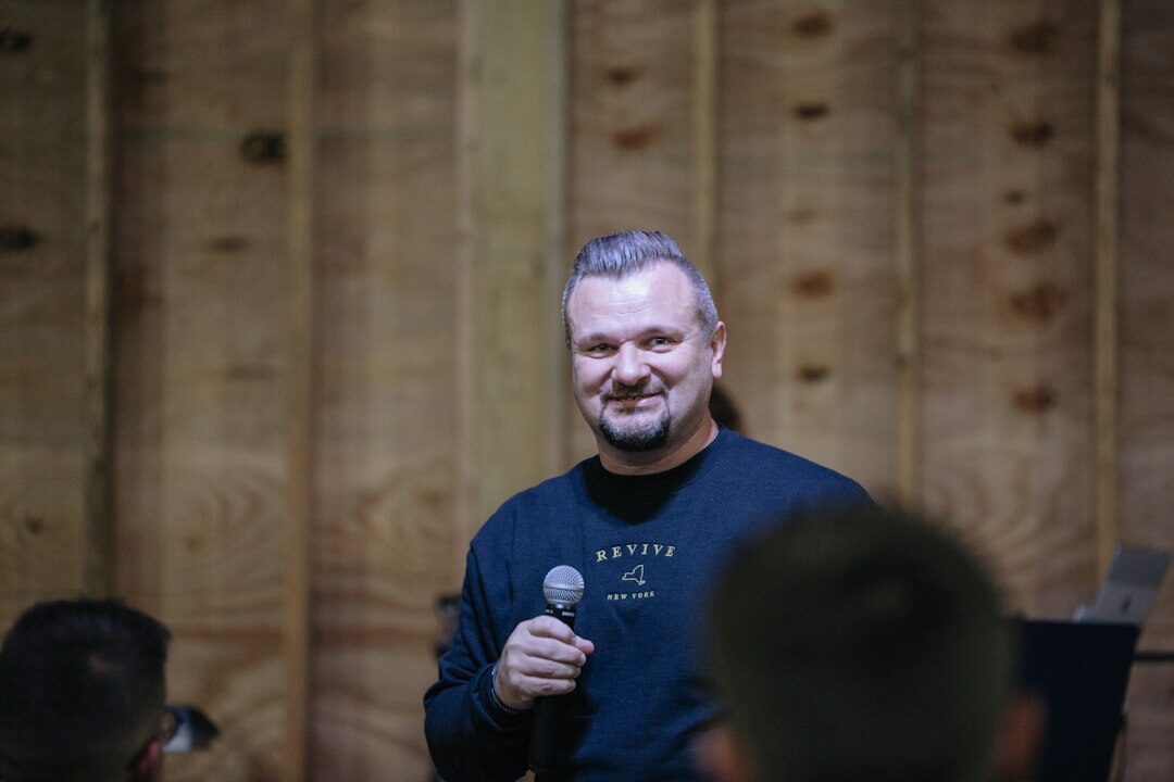 inspiring leader speaking to team