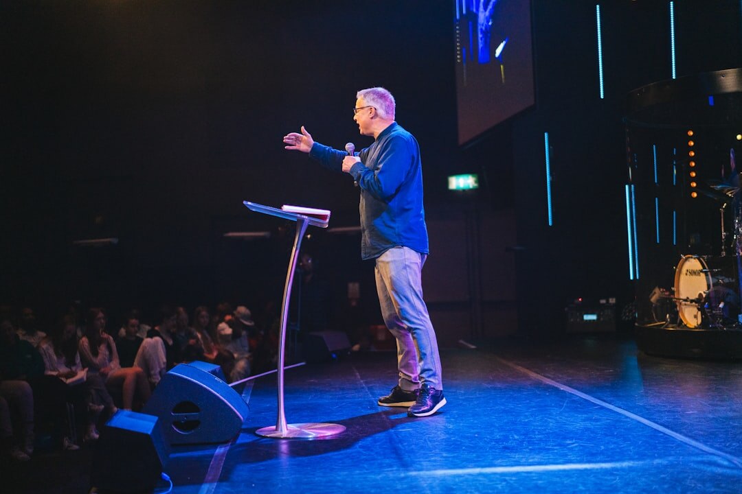 confident speaker on stage